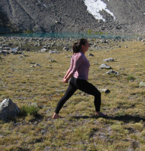 shoulder stretch with hands clasped behind