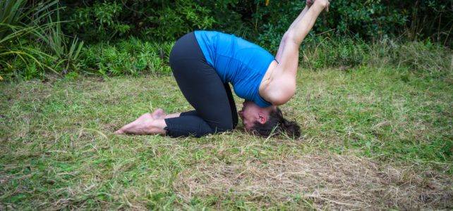 child's pose with shoulder stretch