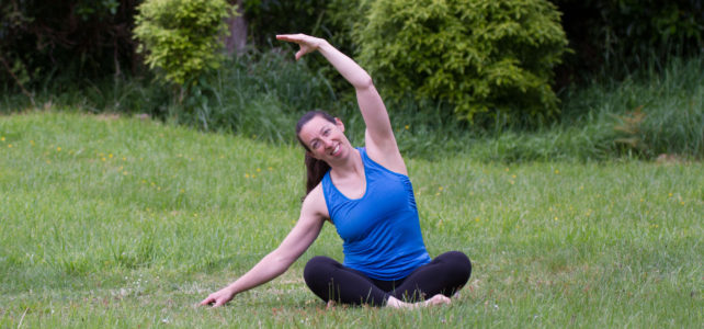 Megan doing a seated side bend