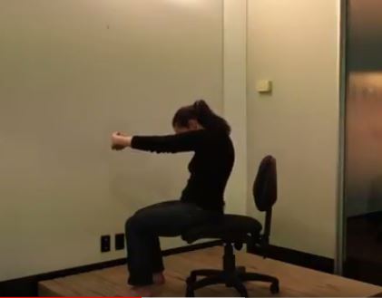 yoga stretch you can do in a chair for the back