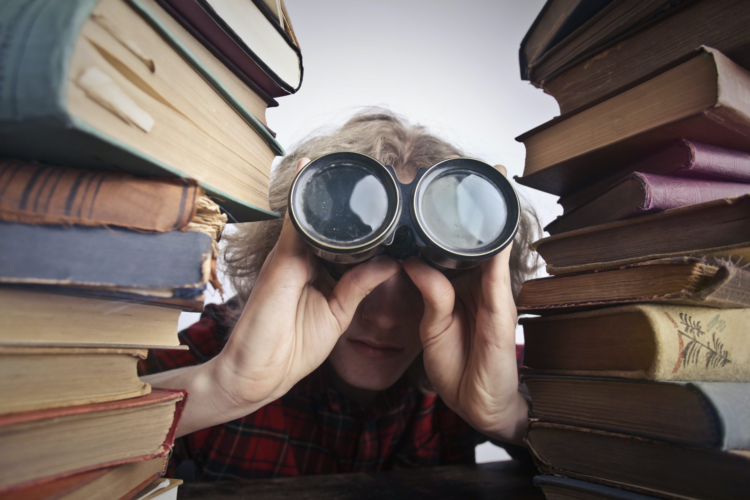 Person lokking at books